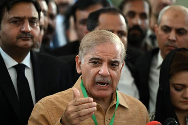 Pakistan’s opposition leader Shehbaz Sharif addresses the members of the media before attending a hearing outside the Supreme Court building in Islamabad on 5 April (Photo: AAMIR QURESHI/AFP via Getty Images)