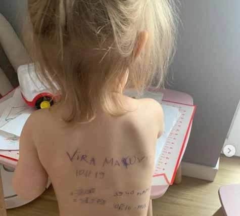 Sasha signed her daughter’s back on 24 February 2022 “in case something happened” 