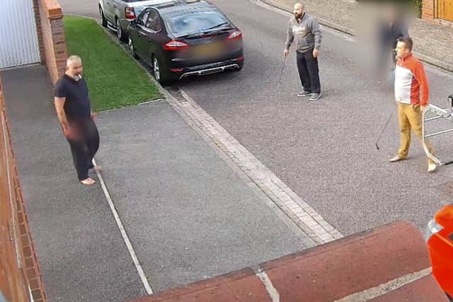CCTV image which has been shown in court which shows barefoot Can Arslan being confronted by two off duty policemen armed with golf clubs after an incident which left one person dead and two stabbed.