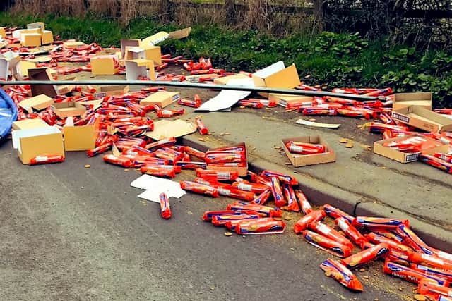 Hundreds of packets of biscuits were spilled from a HGV lorry in Derbyshire. (Credit: SWNS) 