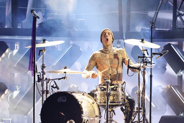 Travis Barker performs onstage during the 64th Annual Grammy Awards (Photo: Rich Fury/Getty Images for The Recording Academy)