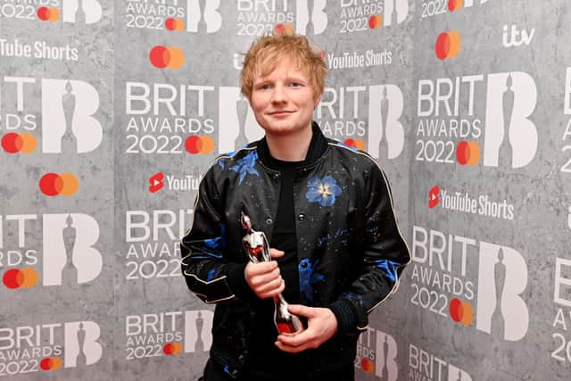 Ed Sheeran posing with his award in the media room during The BRIT Awards 2022 (Photo: Kate Green/Getty Images)