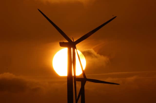 Free standing wind turbines cost more but generate more electricity (image: Getty Images)