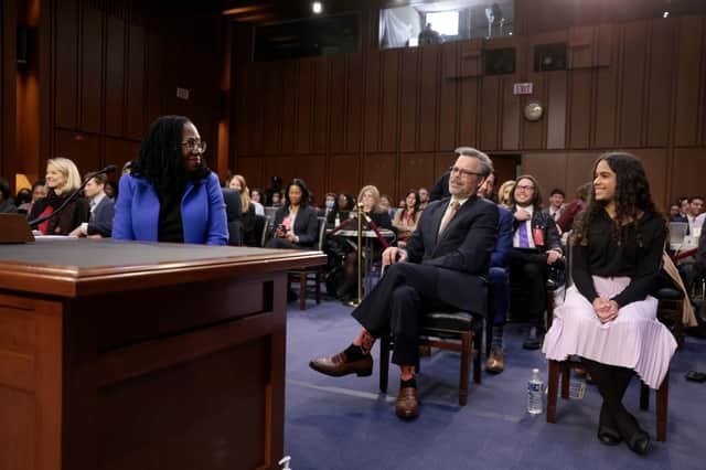 Ketanji Brown Jackson looking to her husband Patrick Jackson and daughter Leila Jackson after the end of the third day of her confirmation hearing (Photo: Anna Moneymaker/Getty Images)