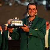 Scottie Scheffler celebrates Masters win with the trophy and Green Jacket. 