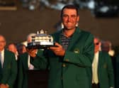 Scottie Scheffler celebrates Masters win with the trophy and Green Jacket. 