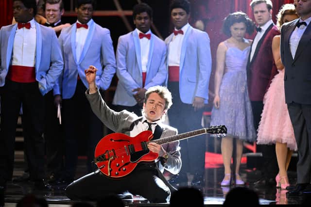 Olly Dobson performing on stage with the cast of Back to the Future (Photo: Jeff Spicer/Getty Images for SOLT)