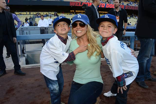 Britney Spears poses with sons Jayden James Federline (L) and Sean Preston Federline (R) at Dodger Stadium on 17 April 2013 (Photo: Jon SooHoo/LA Dodgers via Getty Images)