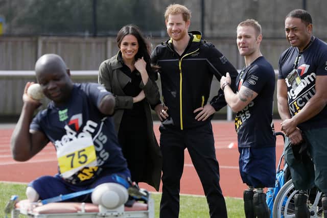 Prince Harry and his wife, Megan Markle at Shot training in 2018