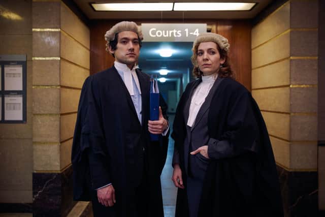 Will Sharpe and Katherine Parkinson, wearing full legal costume, in Defending the Guilty (Credit: BBC)