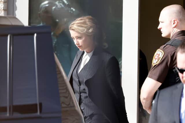 Amber Heard is seen outside court for the start of a civil trial at Fairfax County Circuit Court on April 11, 2022 in Fairfax, Virginia. Depp is seeking $50 million in alleged damages to his career over an op-ed Heard wrote in the Washington Post in 2018. (Photo by Paul Morigi/Getty Images)