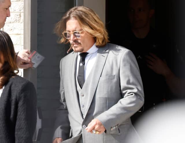 Johnny Depp is seen outside court for the start of a civil trial at Fairfax County Circuit Court on April 11, 2022 in Fairfax, Virginia. Depp is seeking $50 million in alleged damages to his career over an op-ed Heard wrote in the Washington Post in 2018. (Photo by Paul Morigi/Getty Images)
