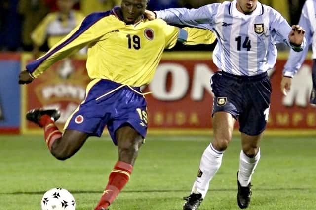 Rincon, left, during elimination game in Bogota, 2000