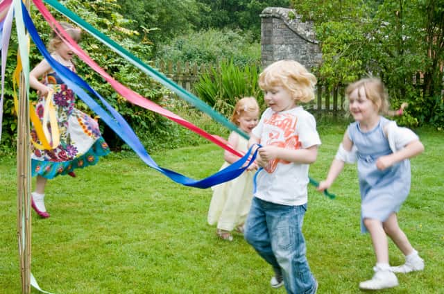 <p>Maypole dancing is a traditional May day activity.</p>