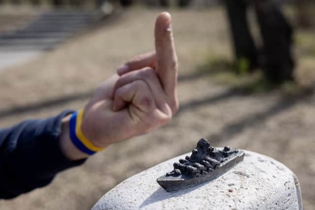 A miniature sculpture reflecting on the loss of the Black Sea Snake Island and commemorating its defenders (Photo: Janos Kummer/Getty Images)