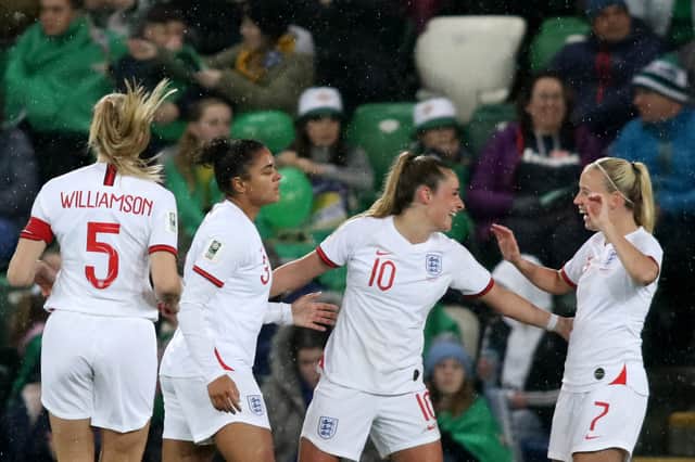 The Lionesses celebrate their second of five goals against Northern Ireland