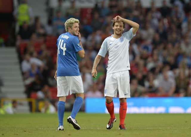 Niall Horan, left, and Louis Tomlinson from One Direction in 2016