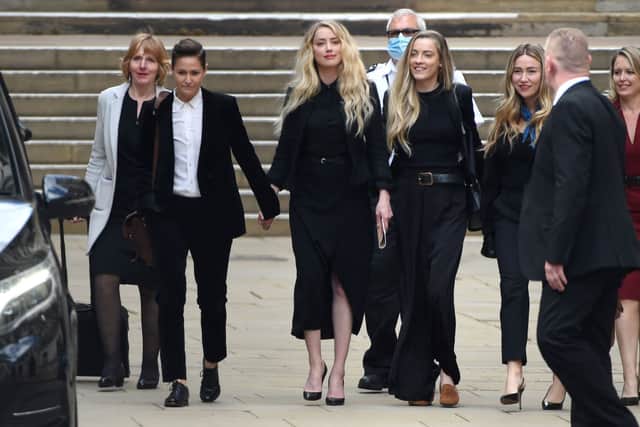 Amber Heard with girlfriend Bianca Butti leaving the Royal Courts of Justice, the Strand on July 28, 2020 in London, England (Photo: Stuart C. Wilson/Getty Images)