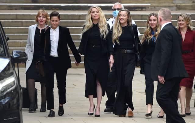 Amber Heard with girlfriend Bianca Butti leaving the Royal Courts of Justice, the Strand on July 28, 2020 in London, England (Photo: Stuart C. Wilson/Getty Images)
