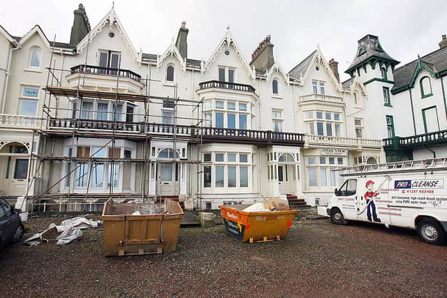 A house (between skip and vehicle) believed to have been previously owned by John Darwin and his wife Anne is pictured in Seaton Carew (Photo: PAUL ELLIS/AFP via Getty Images)