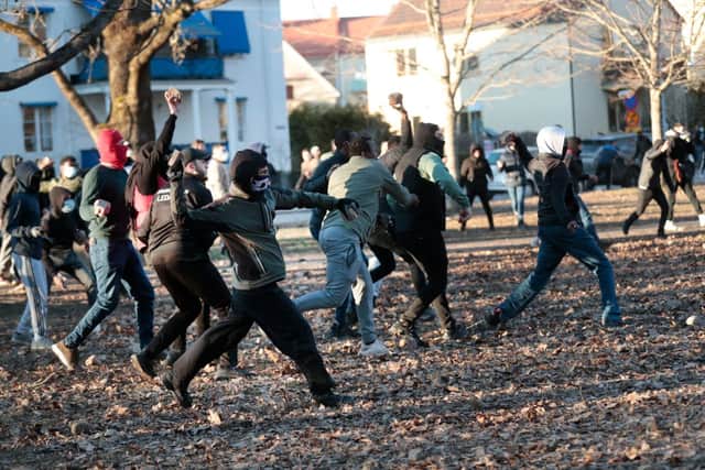 Counter-protesters throw stones in the park Sveaparken in Orebro, south-centre Sweden on April 15, 2022, where Danish far-right party Stram Kurs had permission for a square meeting on Good Friday (Photo: KICKI NILSSON/TT NEWS AGENCY/AFP via Getty Images)