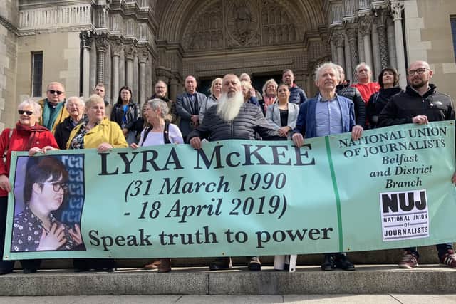 Members of the National Union of Journalists (NUJ) unveil a new banner in memory of murdered journalist Lyra McKee at St Anne’s Cathedral in Belfast to mark the third anniversary of her death