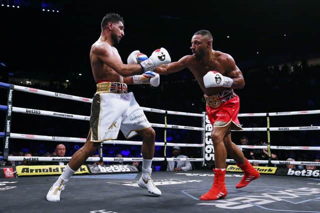 Khan, left, last fought in February where he lost to Brook, right.