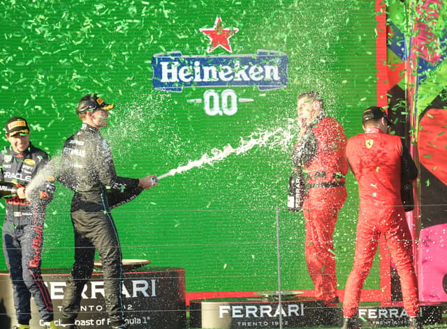 Charles Leclerc celebrates with Russell and Perez in Australia