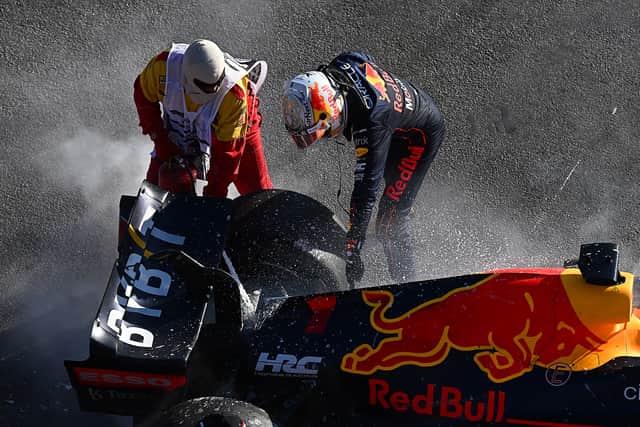 Max Verstappen walks away from car in Australian GP 