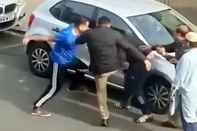 Mobile phone footage shows a group of men clashing in the street where campaigners had been canvassing.