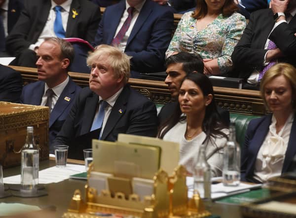 The Prime Minister Boris Johnson (second left) in the House of Commons where he made a statement to MPs following the announcement that he is among the 50-plus people fined so far as part of the Metropolitan Police probe into Covid breaches in Government. (UK Parliament/Jessica Taylor Handout photo)