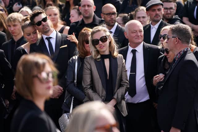 <p>Kelsey Parker (centre) at the funeral of her husband Tom Parker (Photo: PA)</p>