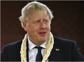 Boris Johnson, who has traveled to India today, vowed to fight the next general election despite calls for him to resign over the partygate scandal (PA)