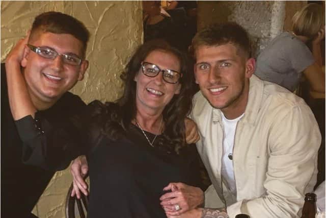 James (right) with mum Lynne Wright and brother Grant Wright