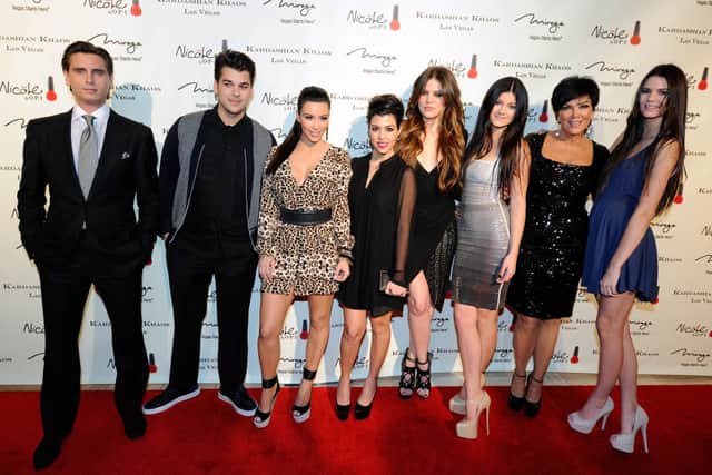 (L-R) Television personalities Scott Disick, Robert Kardashian Jr., Kim Kardashian, Kourtney Kardashian, Khloe Kardashian, Kylie Jenner, Kris Jenner and Kendall Jenner (Photo: Ethan Miller/Getty Images)
