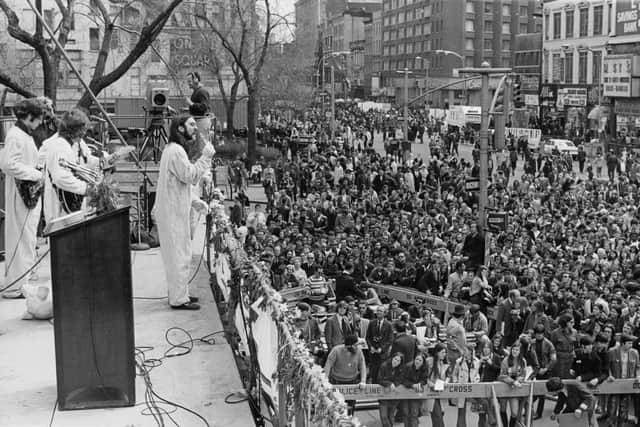 A band performs in front of a large crowd during the Earth Day celebrations in New York City, US, 22nd April 1970. (Photo by Keystone/Hulton Archive/Getty Images)