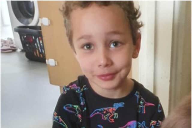 was found partially submerged wearing a pair of dinosaur pyjama bottoms and a Spider-Man top just 250 metres from his home. (South Wales Police)