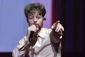 Tom Grennan performing at the Resorts World Arena in Birmingham in November 2021 (Photo: Anthony Devlin/Getty Images for BAUER)