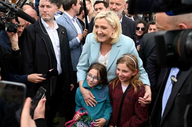 Marine Le Pen has sought to soften her public image during the French election 2022 (image: AFP/Getty Images)