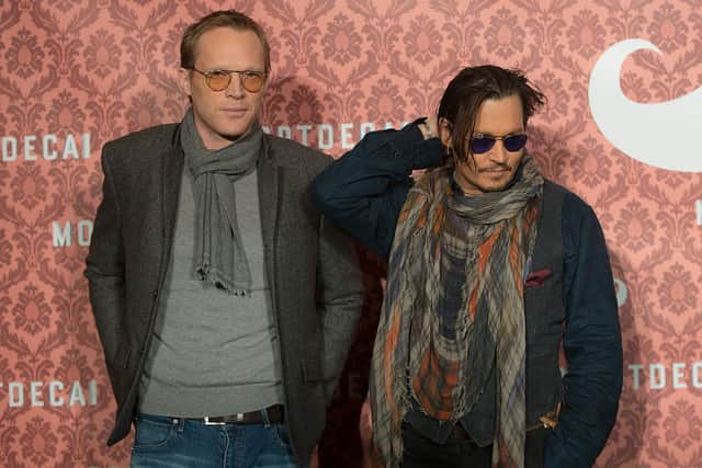 Paul Bettany and Johnny Depp at a photocall for the film Mortdecai on January 18, 2015 in Berlin, Germany (Photo by Christian Marquardt/Getty Images)