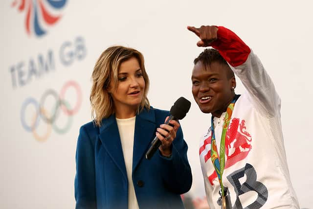Helen Skelton interviewing Nicola Adams of Great Britain at Albert Square during a Rio 2016 Victory Parade for the British Olympic and Paralympic teams on October 17, 2016 in Manchester, England (Photo by Jan Kruger/Getty Images)