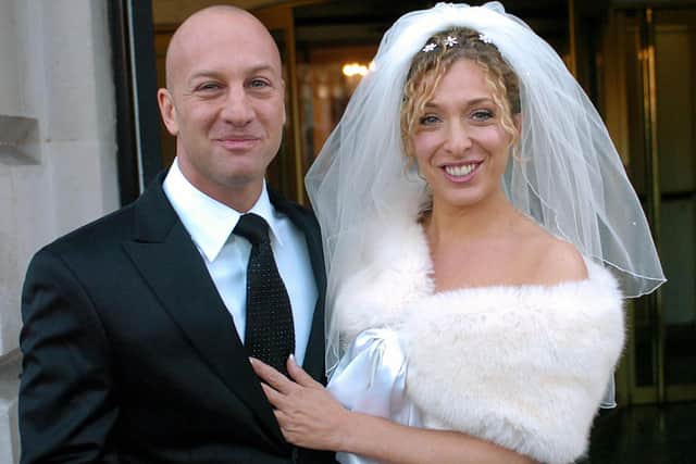 EastEnders’ actress Tracy Ann-Oberman poses after marrying music producer Rob Cowan at the Millennium Hotel, Grosvenor Square in central London, 19 December 2004  (Photo: ARTHUR EDWARDS/AFP via Getty Images)