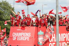 Liverpool celebrating one of their Champions League wins. 