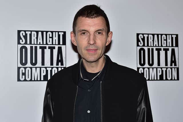 British DJ Tim Westwood posing for a photograph on the red carpet after arriving for the gala screening of the film Straight Outta Compton (Photo: LEON NEAL/AFP via Getty Images)