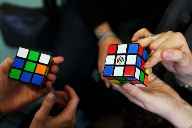 Feliks Zemdegs holds the Guinness World Record for solving a rubik’s cube in 4.22 seconds (Photo: PATRIK STOLLARZ/AFP via Getty Images)