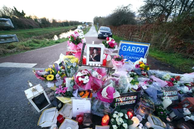 Floral tributes laid at the Grand Canal in Tullamore, Co Offaly, where primary school teacher Ashling Murphy was found dead after going for a run on Wednesday afternoon (Photo: PA)