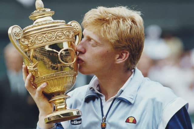 Boris Becker celebrating his victory during the Men’s Singles final of the Wimbledon Lawn Tennis Championship on 7 July 1985 (Photo by Steve Powell/Allsport/Getty Images) 