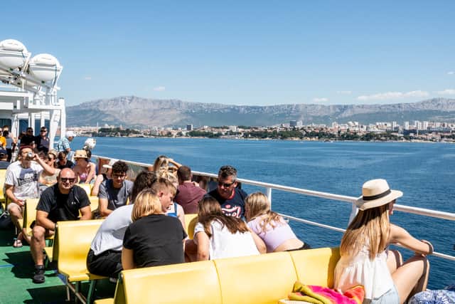 Tourists on the ferry to Split, Croatia.
