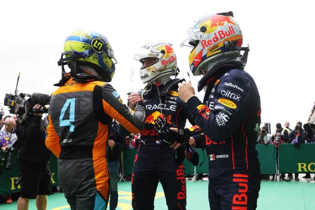 The three Imola podium winners, Lando Norris, Max Verstappen and Sergio Perez (left to right)