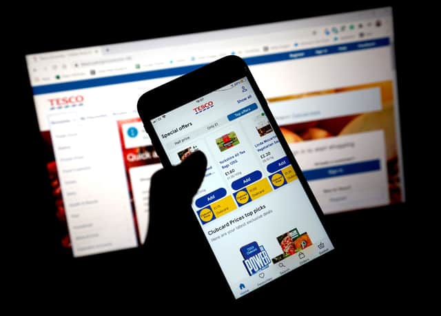 Tesco Clubcard vouchers also appear digitally in the supermarket’s app or online (image: Getty Images)